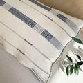 Hand woven local, natural cotton cushion hand stitched with blanket stitch border & mother of pearl buttons 