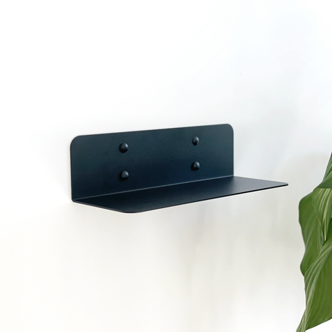 Black steel wall shelf for sale in South Africa