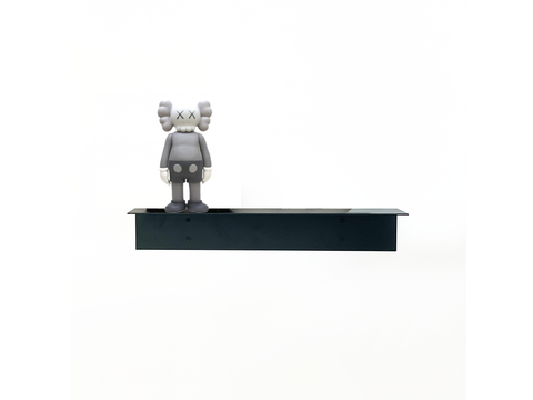 Black steel shelf with a KAWS toy in a modern Johannesburg office design or black metal shelf